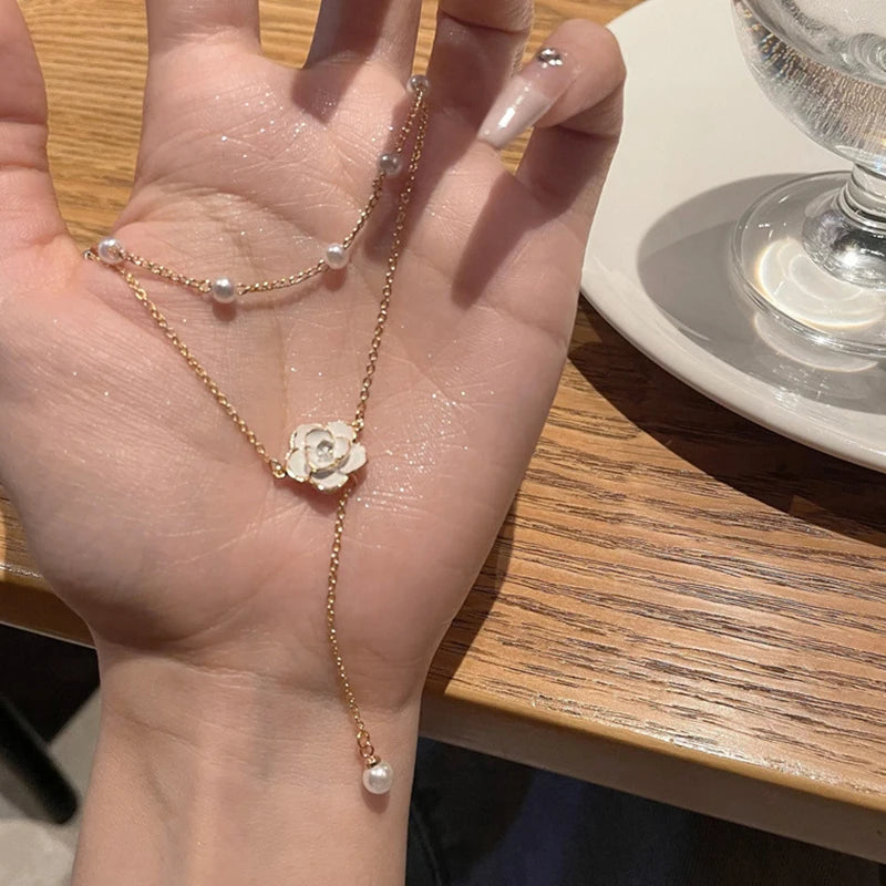 Double layered tassel pearl necklace for female niche design camellia collarbone chain light luxury high-end feel temperament ne