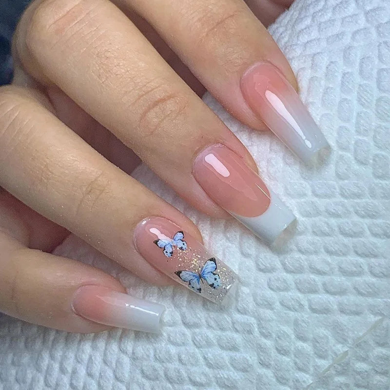 24pcs long coffin French press-on nails in black, featuring elegant bow and diamond details. Chic ballerina-style acrylic nails for a glamorous manicure in minutes.