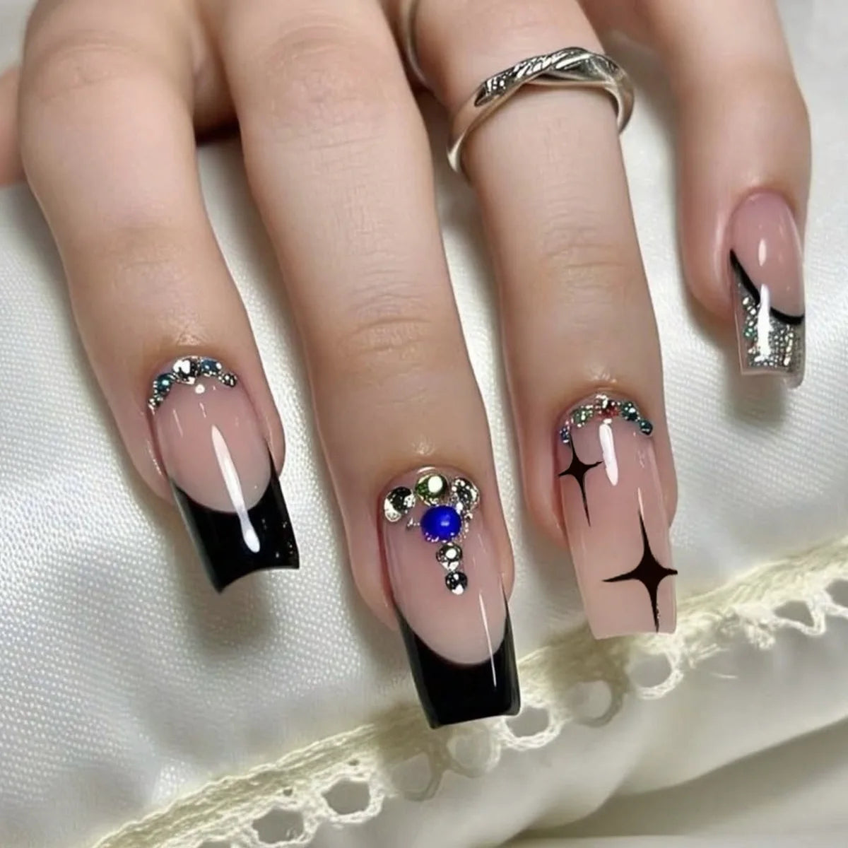 24pcs long coffin French press-on nails in black, featuring elegant bow and diamond details. Chic ballerina-style acrylic nails for a glamorous manicure in minutes.