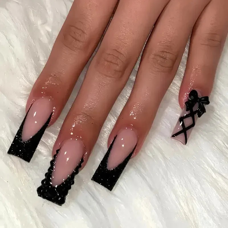 24pcs long coffin French press-on nails in black, featuring elegant bow and diamond details. Chic ballerina-style acrylic nails for a glamorous manicure in minutes.