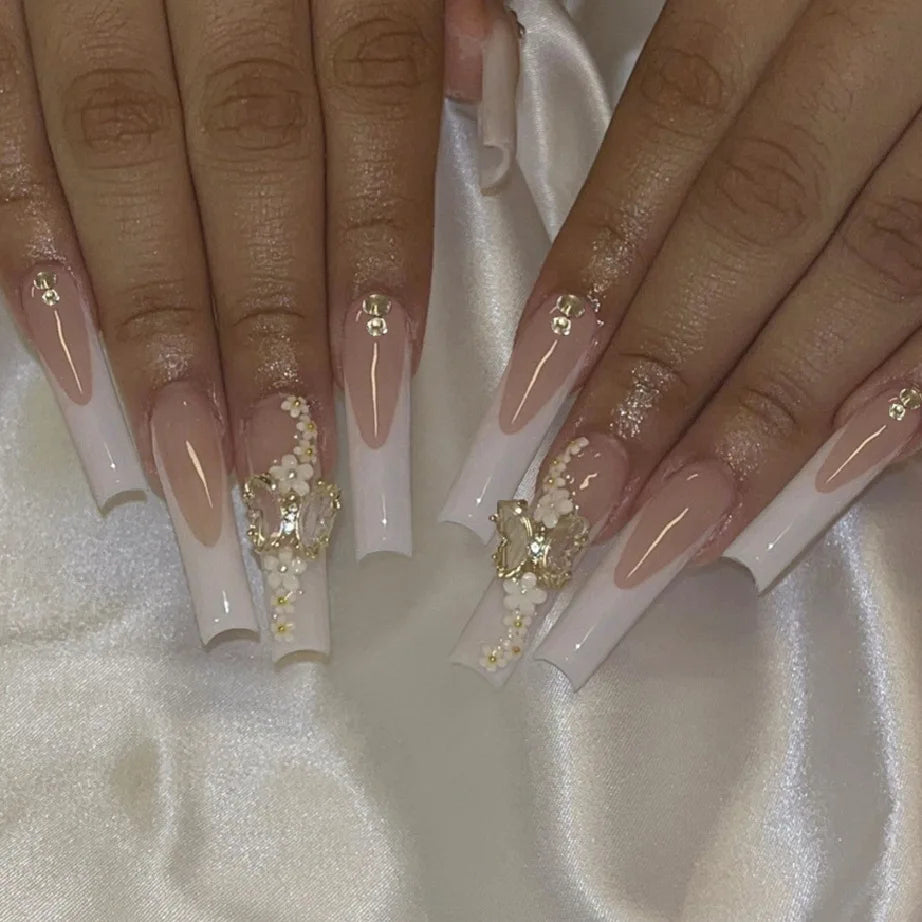 24pcs long coffin French press-on nails in black, featuring elegant bow and diamond details. Chic ballerina-style acrylic nails for a glamorous manicure in minutes.