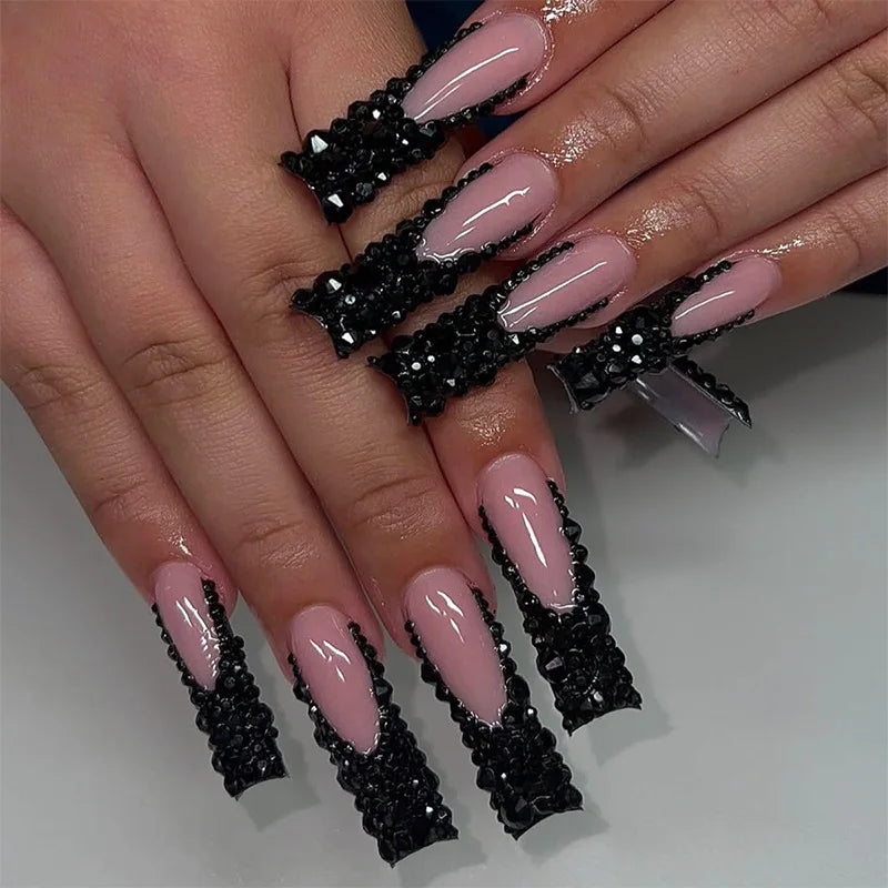 24pcs long coffin French press-on nails in black, featuring elegant bow and diamond details. Chic ballerina-style acrylic nails for a glamorous manicure in minutes.