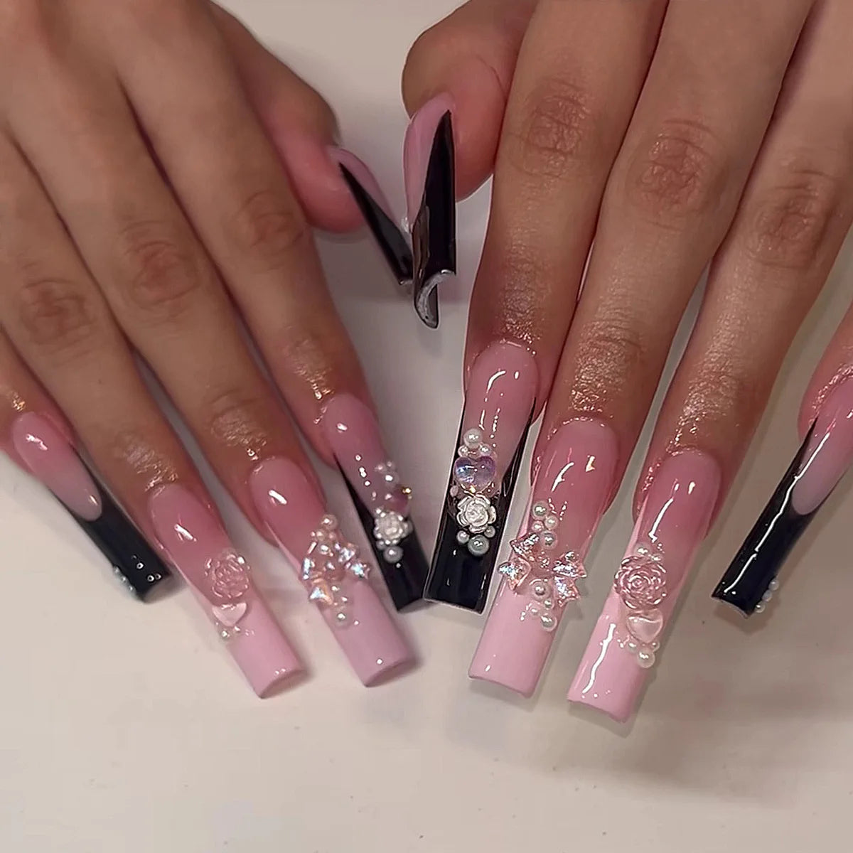 24pcs long coffin French press-on nails in black, featuring elegant bow and diamond details. Chic ballerina-style acrylic nails for a glamorous manicure in minutes.
